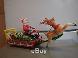 Vintage Xmas Metal Battery Operated Toy Santa Soft Head Sleigh Reindeer