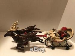 Vintage cast iron Santa sled and reindeers on wheels Mechanical WORKS