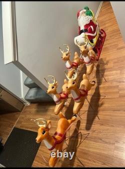 Vintage giant santa in sleigh & 5 reindeer's blowmold