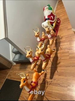 Vintage giant santa in sleigh & 7 reindeer's blowmold