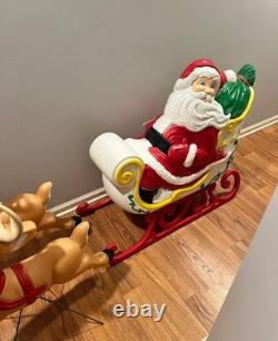 Vintage giant santa in sleigh & 7 reindeer's blowmold