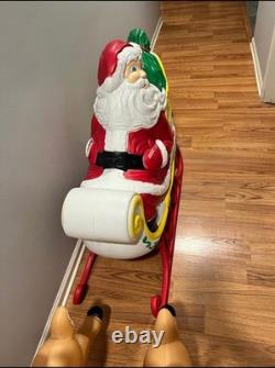 Vintage giant santa in sleigh & 7 reindeer's blowmold