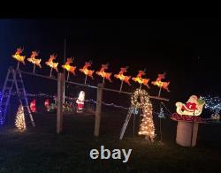 Vintage giant santa in sleigh & 7 reindeer's blowmold