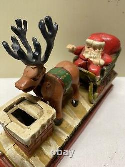 Vtg Cast Iron Mechanical HAPPY HOLIDAY Coin Bank Santa Sleigh & Reindeer