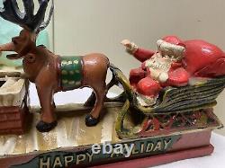 Vtg Cast Iron Mechanical HAPPY HOLIDAY Coin Bank Santa Sleigh & Reindeer