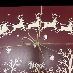 Williams Sonoma Santa Sleigh Reindeer Hard Cork Placemats Lot of 4 Maroon White