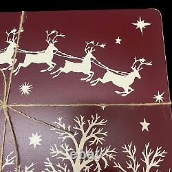 Williams Sonoma Santa Sleigh Reindeer Hard Cork Placemats Lot of 4 Maroon White