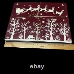 Williams Sonoma Santa Sleigh Reindeer Hard Cork Placemats Lot of 4 Maroon White